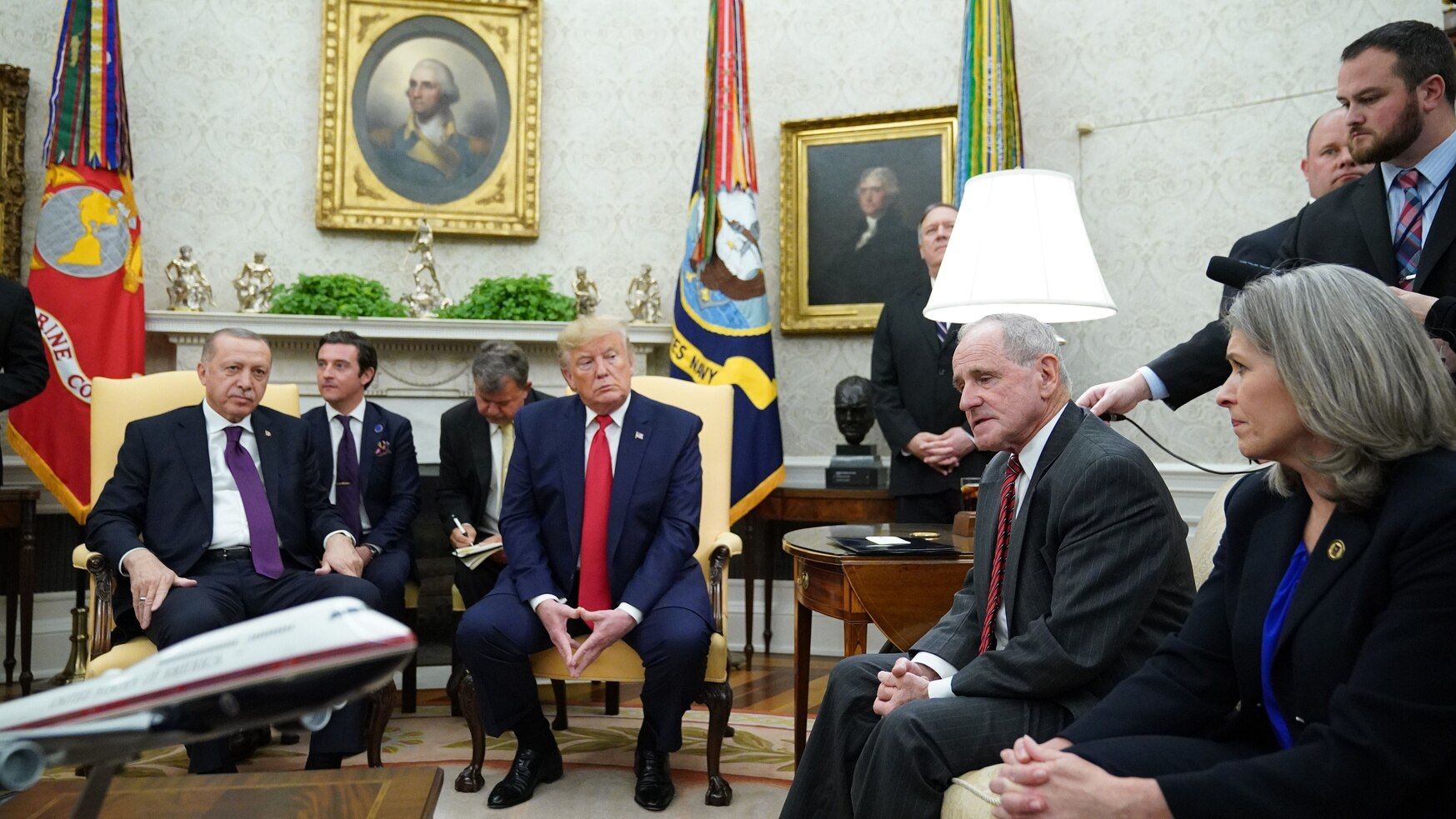 US President Donald Trump (C) and Turkey's President Recep Tayyip Erdogan (L) listen to U.S. Senate Foreign Relations Committee Jim Risch (2nd R) during a meeting in the Oval Office of the White House in Washington, DC on November 13, 2019. (MANDEL NGAN/AFP via Getty Images)