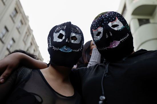 2020-11-03T004831Z_559407050_RC2CVJ9KKXRF_RTRMADP_3_MEXICO-DAYOFTHEDEAD-WOMEN-PROTEST