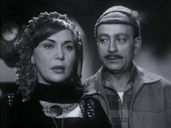 تحية كايروكا و محمود المليجى فى مشهد من فيلم