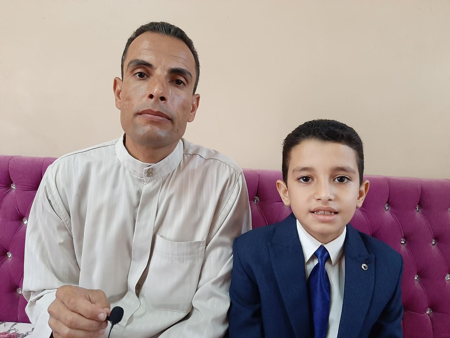 أحمد  مع والده
